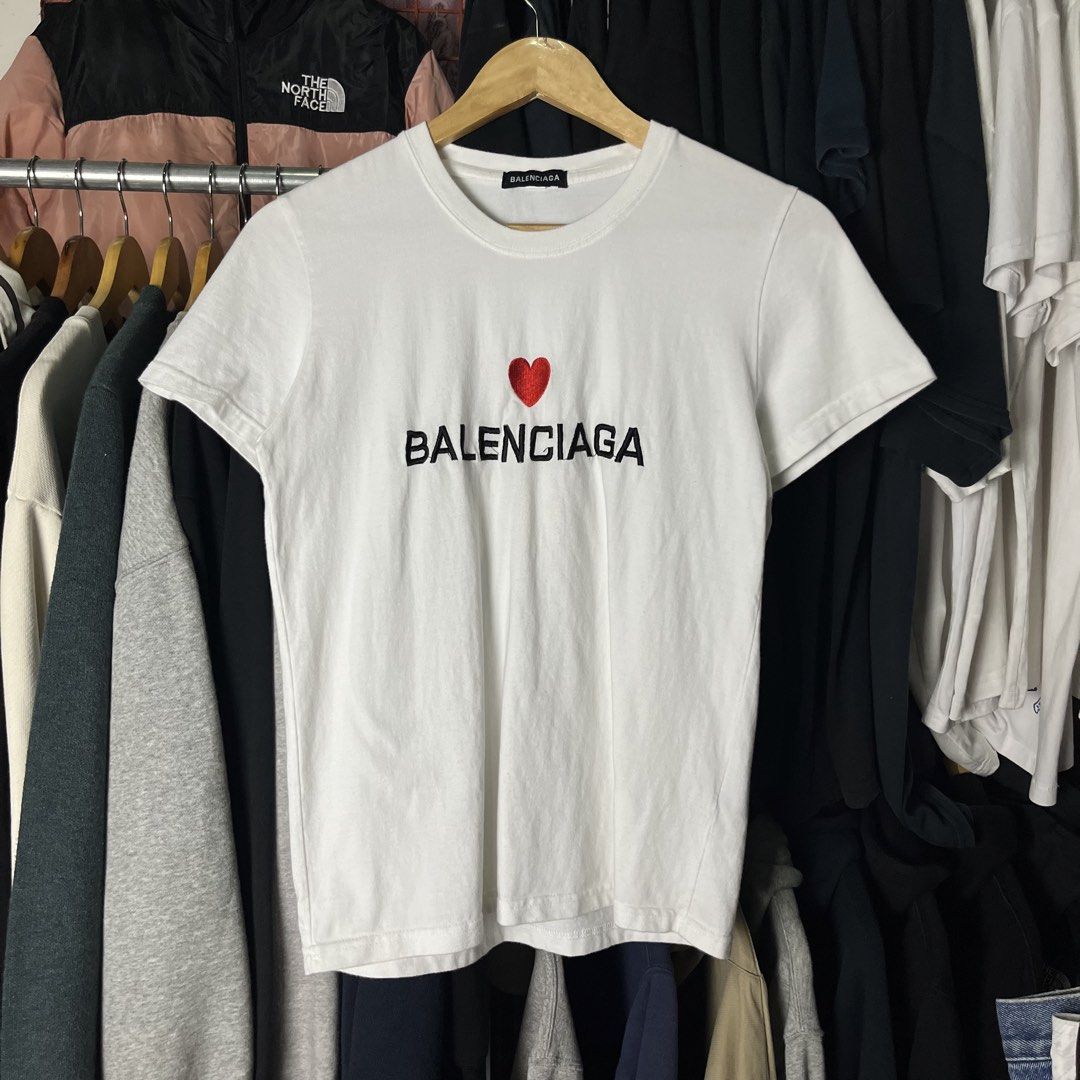 BALENCIAGA HEART LOGO DESIGN (Category: Luxury Apparel) located in Daet. Submitted by wearthriftingcloth. (Listing ID 1467143931, Image 1). Description: 👕BALENCIAGA Size:S Measurement: W17xL23 Issue(s): NONE Condition: 9.5/10 Color rate: 9.5/10 ➡️Swipe- to see more detail pic 📌No Deleting/Cancelation‼️ 📌Color may Vary Due to Lighting‼️ 📌Please be responsible buyer Bogus/Flaker will be posted‼️ 📌All ltems Need Wash‼️.
