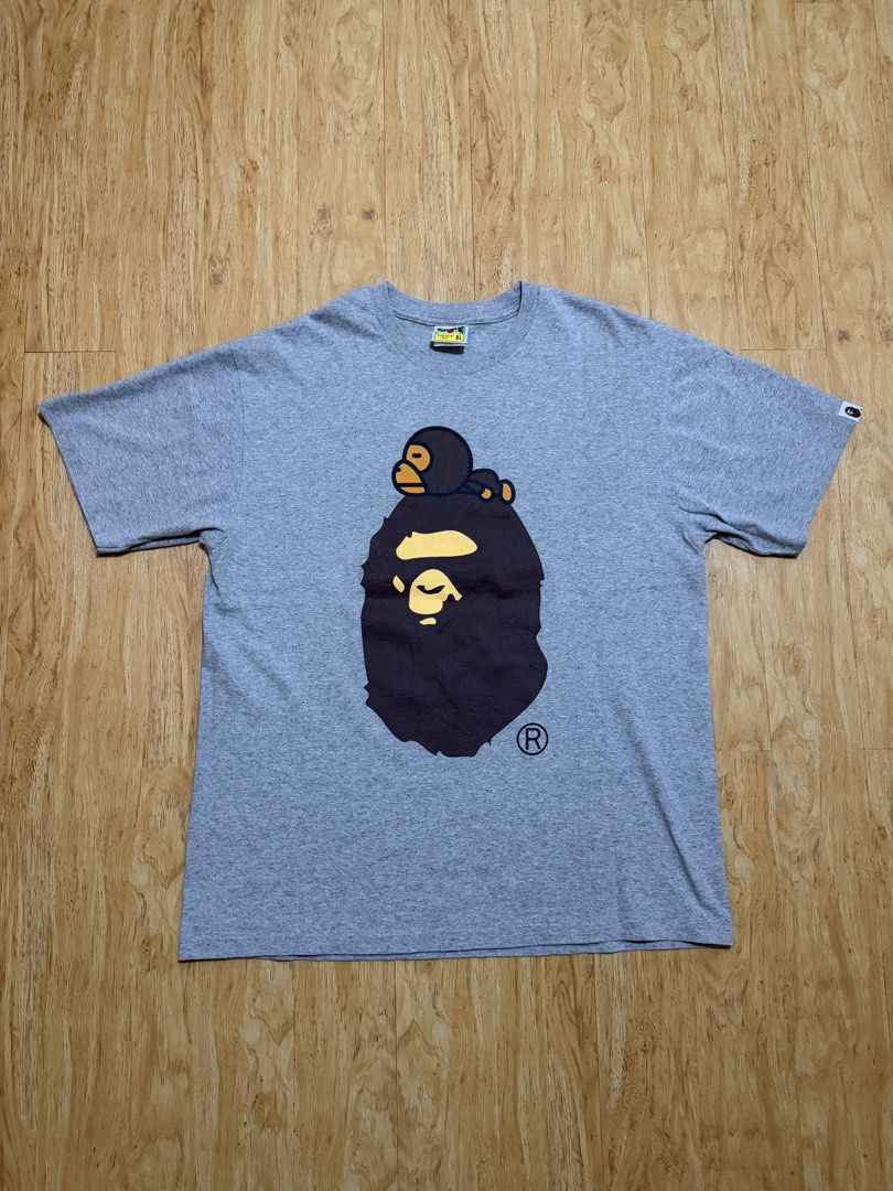 BAPE Milo on Big Head Tee (Category: Tshirts & Polo Shirts ) located in Danao, Cebu. Submitted by yunoball (Listing ID 1467080079, Image 1). Description: Size XL on tag 22x28 Condition: excellent Issues: none Guaranteed authentic.