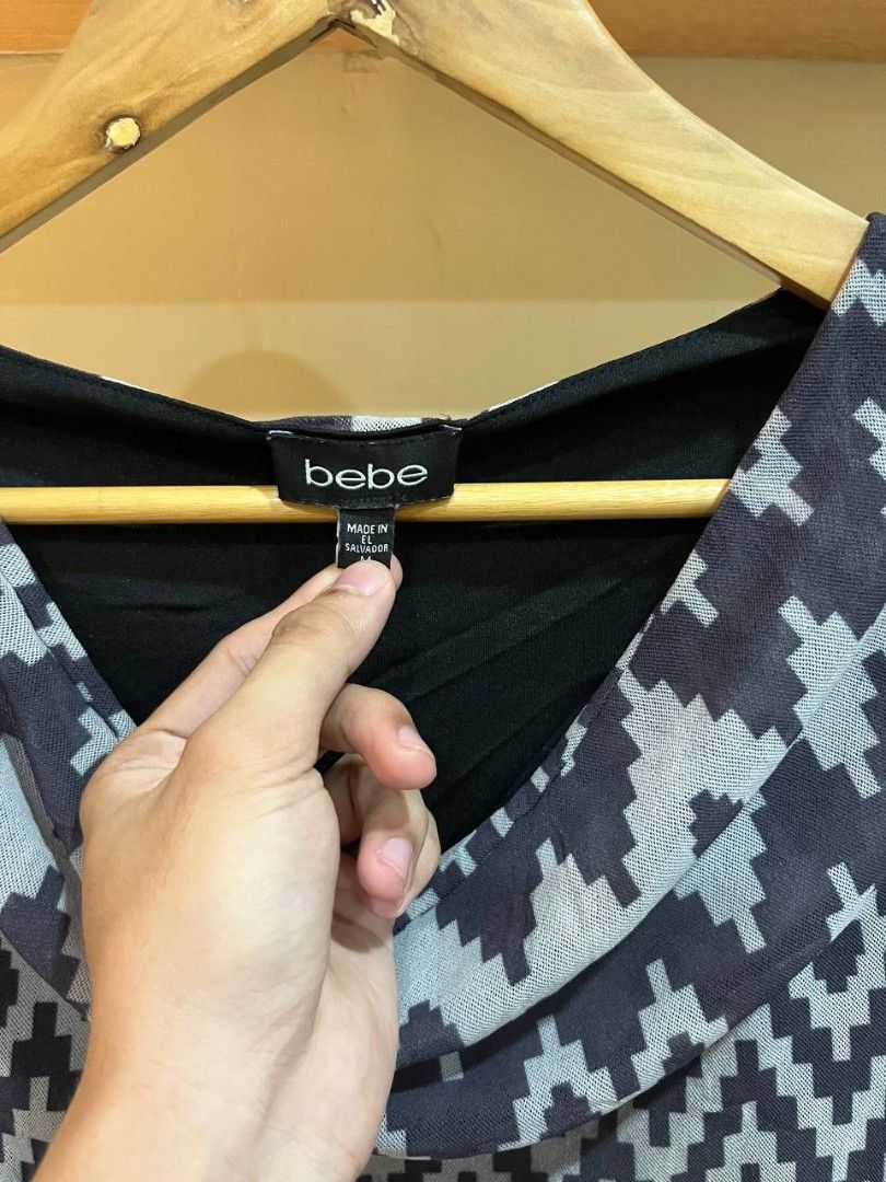 bebe geometric pattern cowl neck bodycon midi dress (Category: Dresses) located in Quezon City. Submitted by michypeachyy1 (Listing ID 1467016108, Image 2). Description: 650 plus shipping medium size.