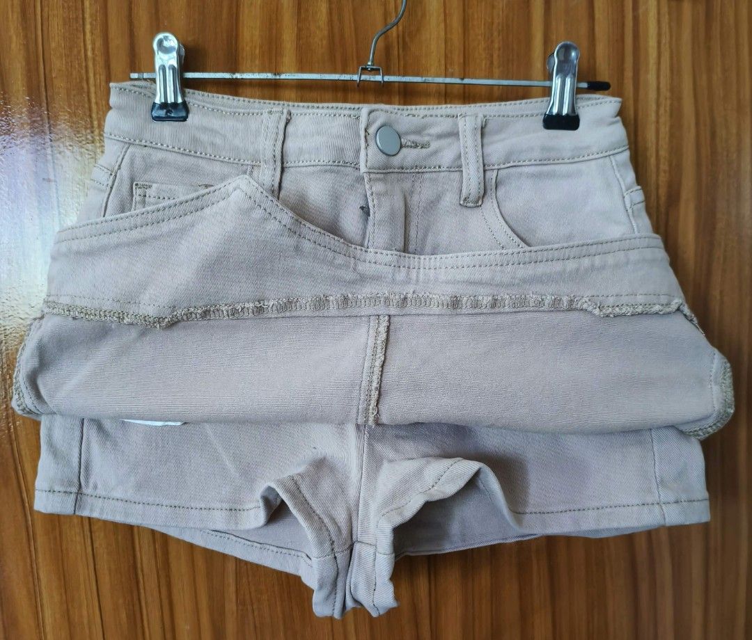 Beige Denim Skort Asymmetrical Hem (Category: Skirts) located in Caloocan City. Submitted by galorylem99656 (Listing ID 1467047661, Image 2). Description: ✨ Condition: Like New 📌 Reason for Selling: Decluttering PRODUCT DETAILS Type: Short Skirt/Skort/Palda Short Waist Height: Mid waist Color: Light Khaki (actual color may vary slightly depending on lighting) Size: Extra Small Waist: 24–26 inches or 64-66cm Hip: 32-33 inches or 80-82 cm Length: 