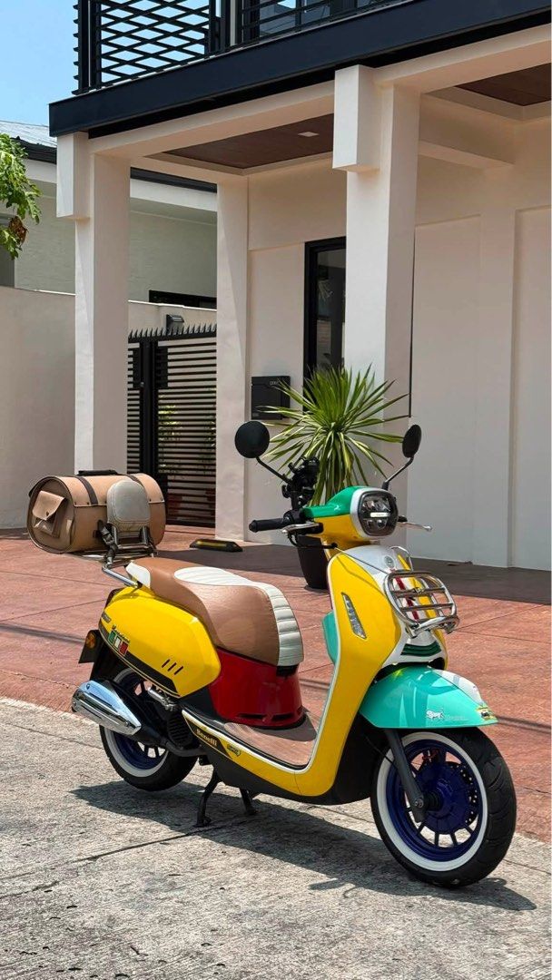 Benelli Panarea 125 (Category: Motorbikes for Sale) located in Manila. Submitted by euviepollack (Listing ID 1466983979, Image 2). Description: Selling ₱67,0000 RUSH! in pristine condition! Benelli panarea 2022/2023 model! SELLING RUSH‼️ - in very very pristine condition!✨ Running 5k mileage only!‼️ NOTE: Vespa Sean Wootherspoon concept! Sticker Wrap only! NOT REPAINTED‼️ Original yellow paint still intact. Sticker wrap can be removed anytime🤗 D