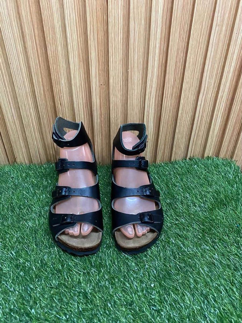 Birkenstock Black Gladiator Sandals Size 36 (Category: Flats & Sandals) located in Butuan. Submitted by chang_14 (Listing ID 1467094777, Image 2). Description: - Brand: Birkenstock - Style: Black leather gladiator sandals with adjustable buckle straps - Size: 36 (Regular fit) - Origin: Made in Germany - Features: Signature comfortable cork footbed and treaded rubber sole - Condition: Clean footbeds, minimal wear on outsoles, ready to wear.