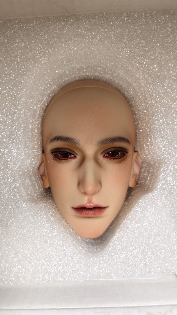 BJD Make-up Doll Head with Red Eyes (Category: Other Merchandise) located in Antipolo. Submitted by skurajj03 (Listing ID 1467141835, Image 1). Description: - Customized resin BJD male doll head - Detailed faceup with reddish eyeshadow, glossy red lips, and dark eyebrows - Features pierced ears and realistic red eyes - Brand new, unused, and stored in protective foam - Ideal collector piece ready for your custom body and wig assembly.