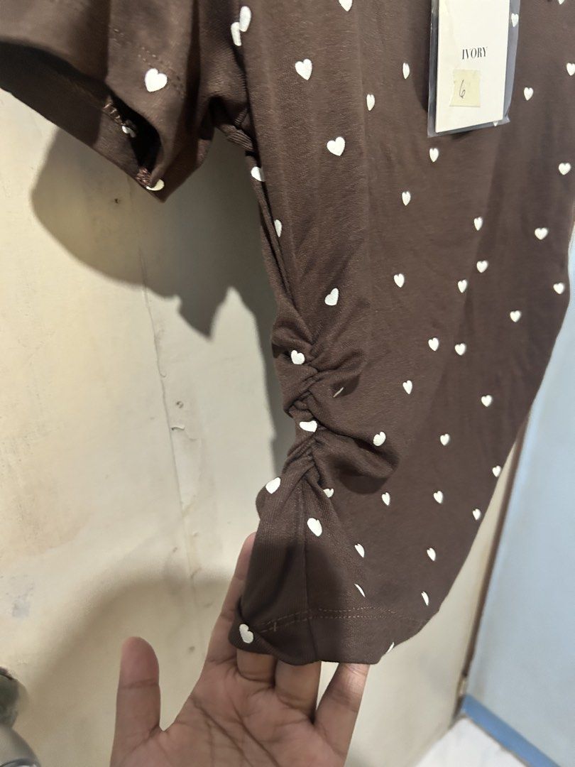 BKK Ivory Polo Top (Category: Blouses) located in Asingan. Submitted by prelovedbykimmy_ (Listing ID 1467001121, Image 2). Description: • brand new with tag • Ivory brand • chocolate brown color • stretchy.