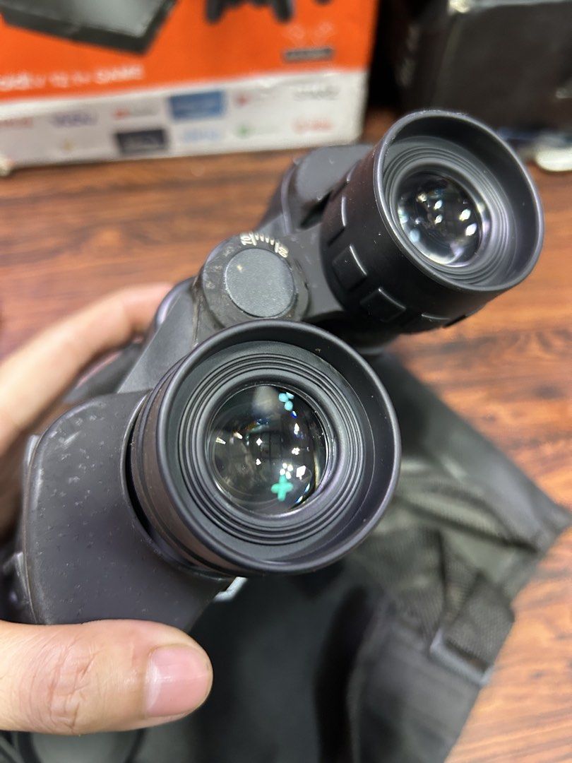 Black Binoculars with Case and Lens Caps (Category: Hiking & Camping) located in Manila. Submitted by starbalesukandjapansurplus (Listing ID 1466978086, Image 3). Description: -waterproof - Crystal clear glass lenses on both ends for sharp viewing - Smooth center focusing wheel and easily adjustable eyepieces - Includes a convenient soft black carrying case and multiple protective lens caps - Ideal for hiking, bird watching, camping, and other ou