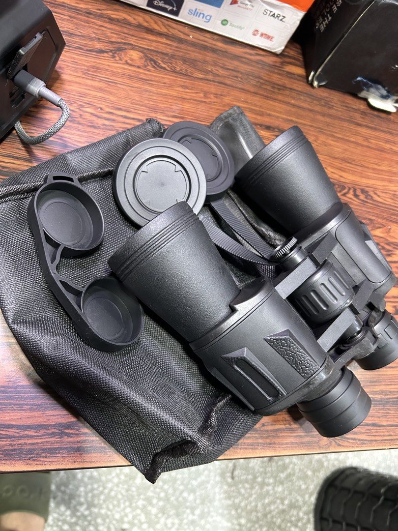 Black Binoculars with Case and Lens Caps (Category: Hiking & Camping) located in Manila. Submitted by starbalesukandjapansurplus (Listing ID 1466978086, Image 1). Description: -waterproof - Crystal clear glass lenses on both ends for sharp viewing - Smooth center focusing wheel and easily adjustable eyepieces - Includes a convenient soft black carrying case and multiple protective lens caps - Ideal for hiking, bird watching, camping, and other ou