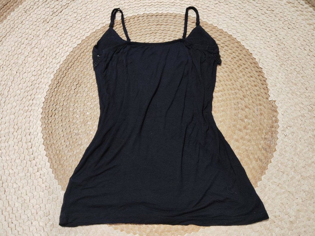 Black Cami Top Ruffled Front with Beading (Category: Sleeveless) located in San Juan City. Submitted by rhennx (Listing ID 1467156718, Image 3). Description: - Color: Black - Material: Soft fabric with mesh ruffles - Features: Adjustable spaghetti straps, chest ruffles with shiny beads - Fit: Fitted style - Condition: Excellent, clean with no loose threads or missing beads.