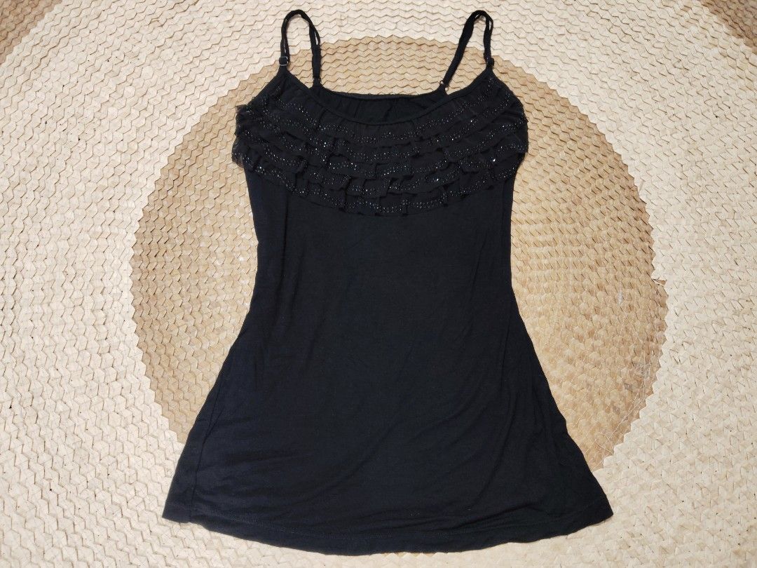 Black Cami Top Ruffled Front with Beading (Category: Sleeveless) located in San Juan City. Submitted by rhennx (Listing ID 1467156718, Image 1). Description: - Color: Black - Material: Soft fabric with mesh ruffles - Features: Adjustable spaghetti straps, chest ruffles with shiny beads - Fit: Fitted style - Condition: Excellent, clean with no loose threads or missing beads.