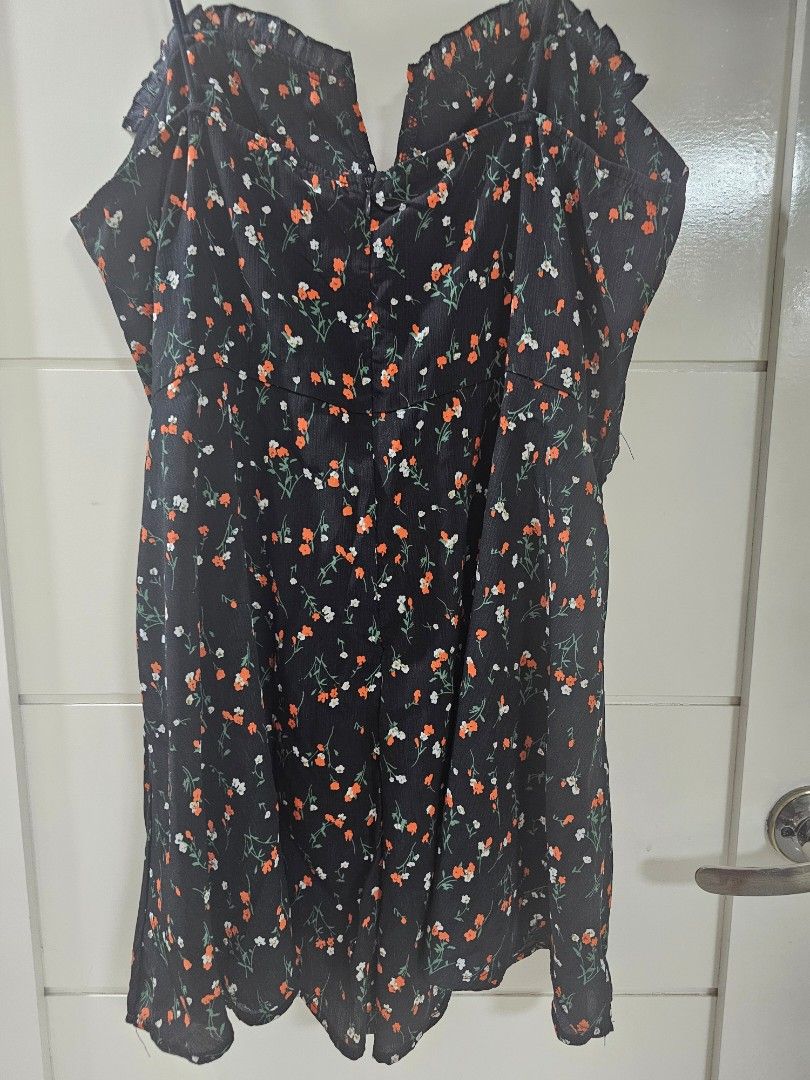 Black Floral Print Spaghetti Strap Romper Playsuit (Category: Rompers) located in Santo Tomas. Submitted by buybugs (Listing ID 1467114820, Image 2). Description: - Like brand new - Chic black with an all-over red and white floral print - Flattering sweetheart neckline with spaghetti straps - Cute ruffle trim details at the chest - Comfortable flowy shorts bottom half - Lightweight material, perfect for casual days or dates -Buyer will cover the 