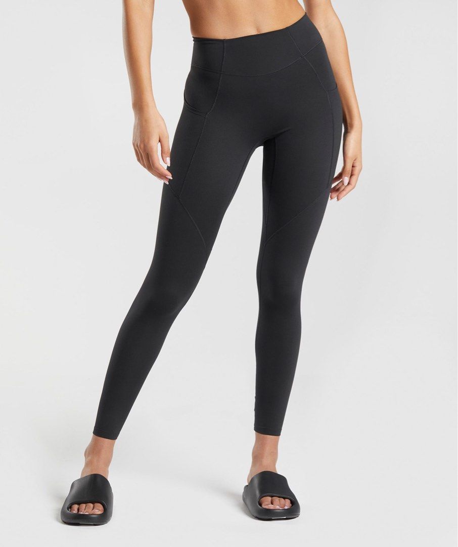 gymshark Black High-Waisted Athletic Leggings with Side Pockets (Category: Activewear) located in Angeles City. Submitted by alejeong27 (Listing ID 1467003724, Image 2). Description: - Color: Solid black - Fit: High waist with supportive waistband design - Features: Built-in side pockets that easily fit a phone - Material: Comfortable and stretchy - Quality: Clean stitching - Ideal for: Workouts or daily wear.