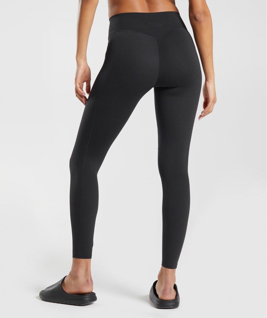 gymshark Black High-Waisted Athletic Leggings with Side Pockets (Category: Activewear) located in Angeles City. Submitted by alejeong27 (Listing ID 1467003724, Image 3). Description: - Color: Solid black - Fit: High waist with supportive waistband design - Features: Built-in side pockets that easily fit a phone - Material: Comfortable and stretchy - Quality: Clean stitching - Ideal for: Workouts or daily wear.