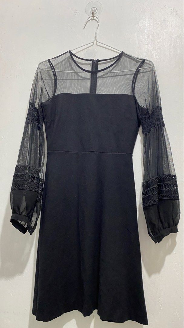 Black Long Sleeve Sheer Mesh Dress (Category: Dresses) located in Ozamiz City. Submitted by icadls (Listing ID 1467126621, Image 2). Description: - Style: Knee-length fit dress - Color: Black - Design details: Sheer mesh top yolk, long sleeves with intricate lace trim banding, and a classic square neckline - Closure: Convenient back zipper - Condition: Worn only once for a dinner event, super clean and well-maintained - Ideal for: Date nights, fo