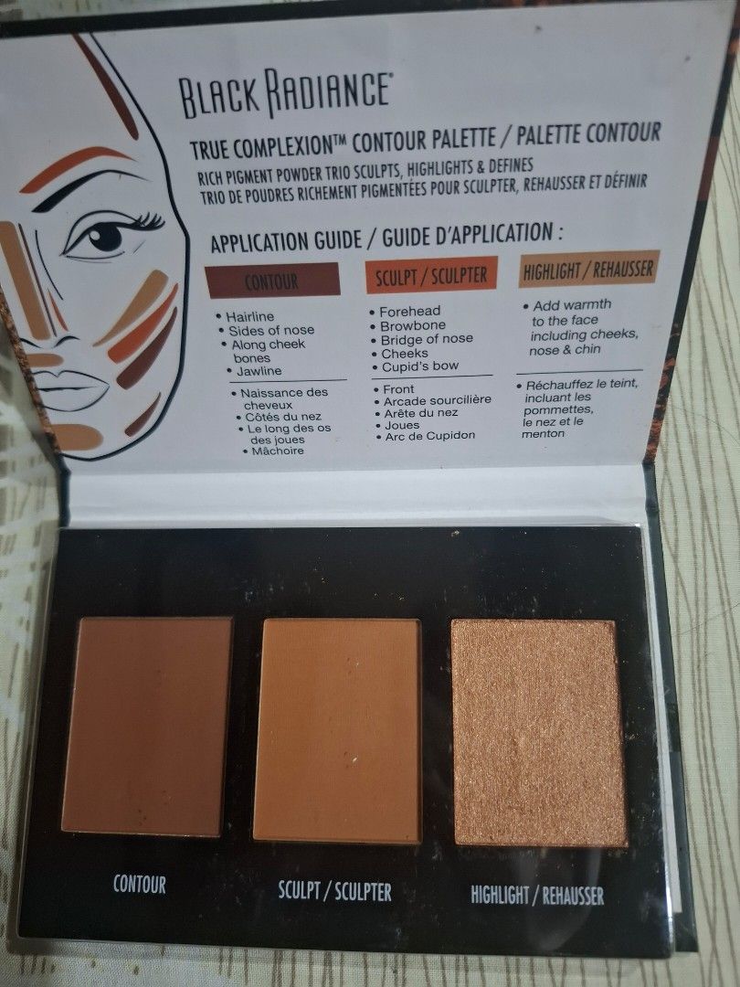 Black Radiance True Complexion Contour Palette Medium to Dark (Category: Makeup) located in Rizal. Submitted by mirisica (Listing ID 1462567066, Image 3). Description: - Black Radiance True Complexion Contour Palette - Designed for medium to dark skin tones - Includes highlight/rehausser and sculpt/sculpted powders - Perfect for defining and shaping facial features - Easy to blend and buildable powders - Achieve a sculpted look.