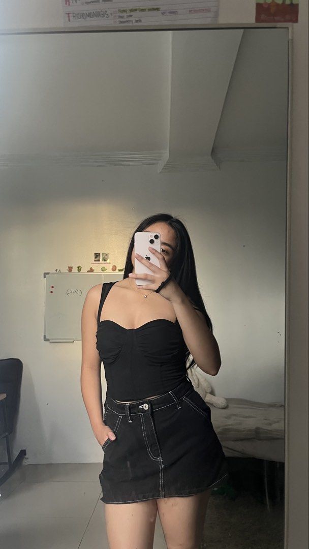 Black Ruched Bustier Tank Top (Category: Sleeveless) located in Manila. Submitted by iayo.15 (Listing ID 1467070936, Image 1). Description: - Color: Black - Style: Corset-style tank top with structured bust detailing - Fit: Fitted silhouette, cropped cut, true to size - Features: Thick straps - Best paired with: High-waisted denim for going out.