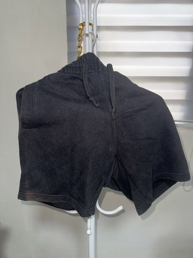 Black Sweatshorts Size S Drawstring Waist Pockets (Category: Shorts) located in La Trinidad. Submitted by prelovedandfindsbyji (Listing ID 1466978796, Image 1). Description: - Color: Black - Size: Small - Material: Cotton and polyester blend (Made in Indonesia) - Features: Elastic waistband with adjustable drawstring, side pockets, and a back pocket - Condition: Pre-loved with some fabric pilling and a noticeable reddish discoloration/bleach stai