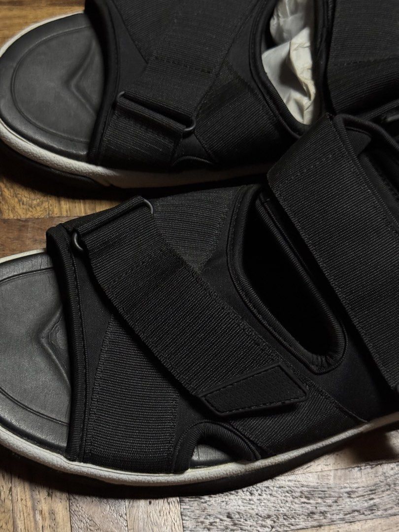 Black velcro strap comfort sandals (Category: Flats & Sandals) located in Manila. Submitted by seangoart (Listing ID 1467144400, Image 3). Description: - Color: Black - Style: Adjustable sandals with thick velcro straps - Comfort: Cushioned footbed for daily wear - Sole: Durable sole with a stylish white edge - Condition: Clean, well-maintained, stored with paper stuffing.