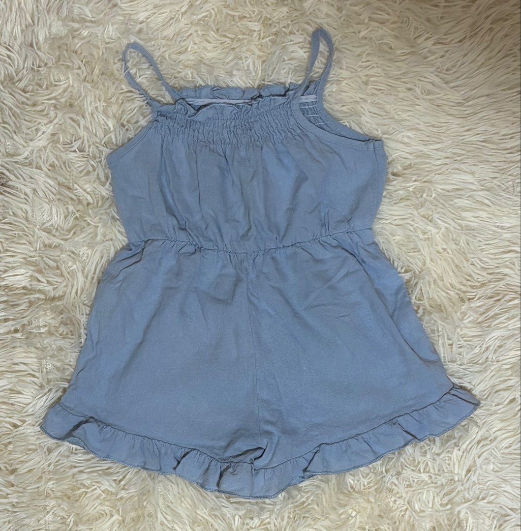 Blue spaghetti strap romper with ruffled hem (Category: Babies & Kids Fashion) located in Santa Cruz. Submitted by zellethrifts (Listing ID 1467151696, Image 2). Description: •Romper 9-12 months •Excellent condition •Pants Size 9-12 months •Issue: there are soil stain on knee part (removable) • Take all ₱100 🚚 Shipping via J&T only 📦 Shipping fee to be shouldered by buyer 💳 Mode of payment: GCash 📍 Santa Cruz, Laguna.