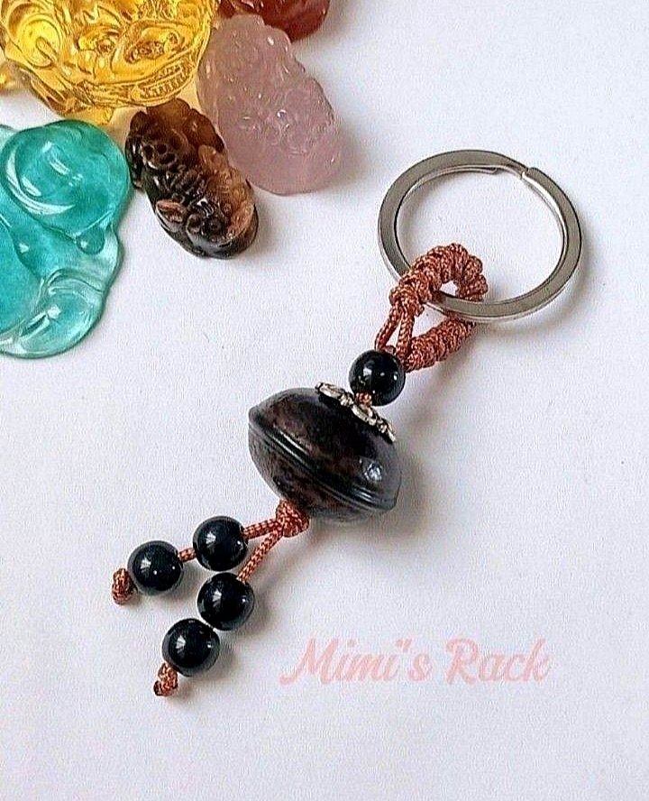 BODHI NUT SEED KEYRING KEYCHAIN (Category: Charms) located in Taguig. Submitted by mimisrack (Listing ID 1467159504, Image 1). Description: 🤎Sacred seed charm for mindfulness and everyday blessings -Bodhi nut seed symbolizes spiritual growth, awareness, and enlightenment -Traditionally associated with meditation and mindful living -Natural organic texture with earthy, grounding feel -Carried as a protective and blessing talisman -Lightweight and