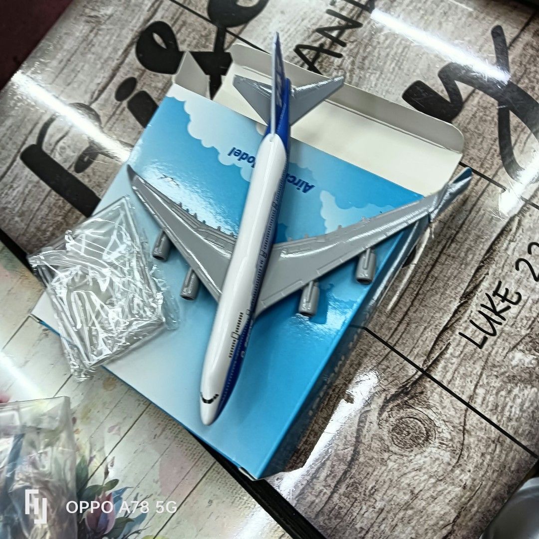 Boeing 747 Aircraft Model with Original Box (Category: Vehicle & Diecast Models) located in Manila. Submitted by iliasjen3082126 (Listing ID 1467065752, Image 2). Description: - Item: Boeing 747 diecast airplane model - Livery: Classic blue and white with Intercontinental tail and fuselage markings - Inclusions: Includes a display stand (still wrapped in plastic) and the original blue packaging box - Condition: Great collector piece, ideal for av