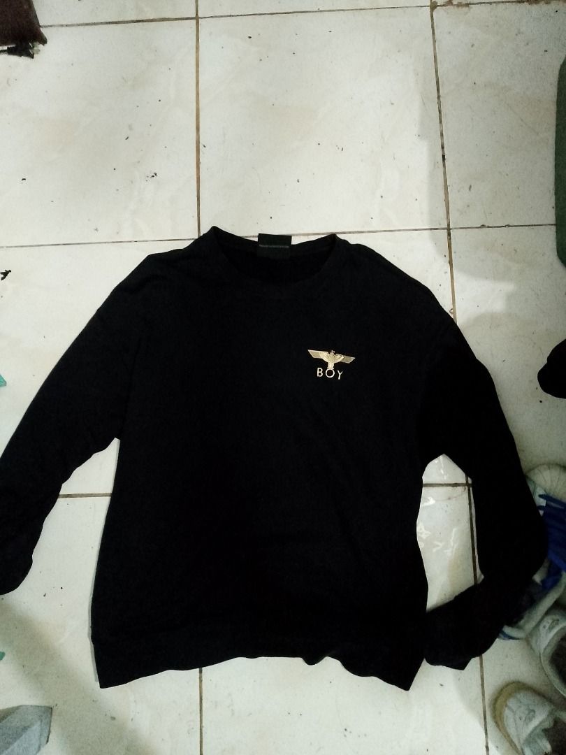 Boy London Black Eagle Logo Sweatshirt Size S (Category: Coats, Jackets and Outerwear) located in Caloocan City. Submitted by akosiwaron_thrift2600 (Listing ID 1467164043, Image 1). Description: - Brand: Boy London - Color: Black - Size: S (fits true to size) - Material: 100% cotton (breathable and comfortable) - Design: Iconic gold eagle logo on chest, large graphic wing print across the back - Details: Ribbed crew neck, cuffs, and hem with webs