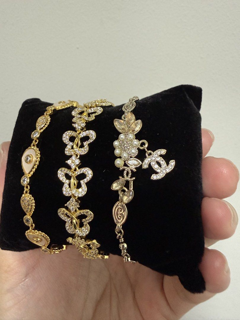 Bracelets (Category: Bracelets) located in Singapore. Submitted by taurielqueenoftheelves (Listing ID 1467113153, Image 3). Description: > $15 each > pp $39 each 1. Gold Teardrop 15.5-16.5cm 2. Gold Butterfly 16-19cm 3. Silver Chanel 16-20cm.