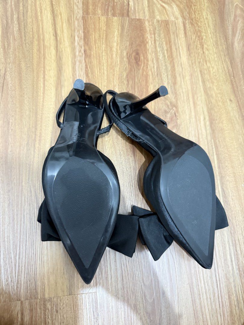 Zara Black Bow Slingback Heels (Category: Heels) located in Manila. Submitted by tvntdd (Listing ID 1467036731, Image 2). Description: - Brand: Zara - Style: Black satin slingback stiletto heels with pointed toe and large statement bow - Size: 37 EU - Condition: Excellent - Inclusion: Original Zara dust bag - Perfect for: Date nights, parties, and formal occasions.