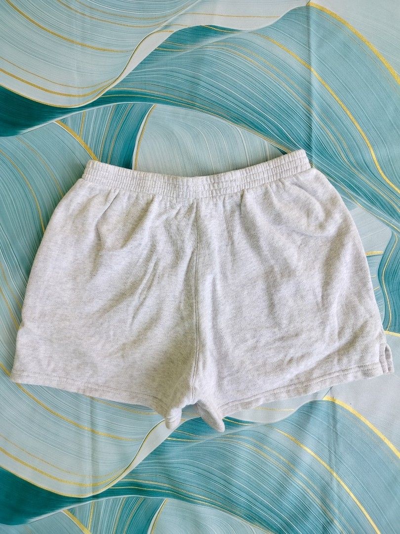 Brandy Melville grey sweatshorts (Category: Shorts) located in Manila. Submitted by virgiliosa38485 (Listing ID 1467112924, Image 3). Description: - Brand: Brandy Melville -Waist 28-38 - Color: Light marled grey - Material: Super soft and comfy cotton - Features: Elastic waistband and convenient side pockets - Style: Easy to match with any basic tee or hoodie - Condition/Use: Great for lounging at home or running quick errands.