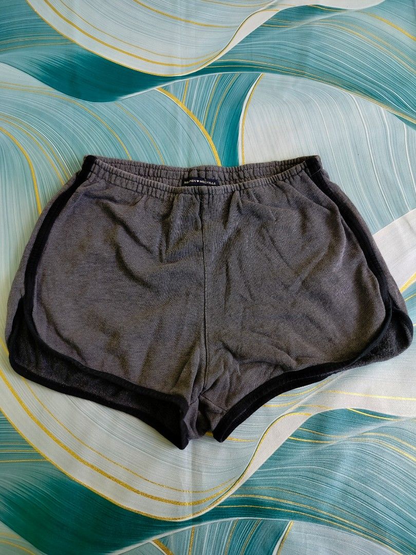 Brandy Melville Heather Grey Shorts (Category: Shorts) located in Manila. Submitted by virgiliosa38485 (Listing ID 1467113076, Image 1). Description: - Brand: Brandy Melville -Waist 28-36 - Color/Style: Grey cotton blend with contrast black trim - Interior: Soft fleece lining for maximum comfort - Fit: Elastic waistband, one size fits most - Origin: Made in Italy - Condition: Great for lounging, sleeping, or casual wear.