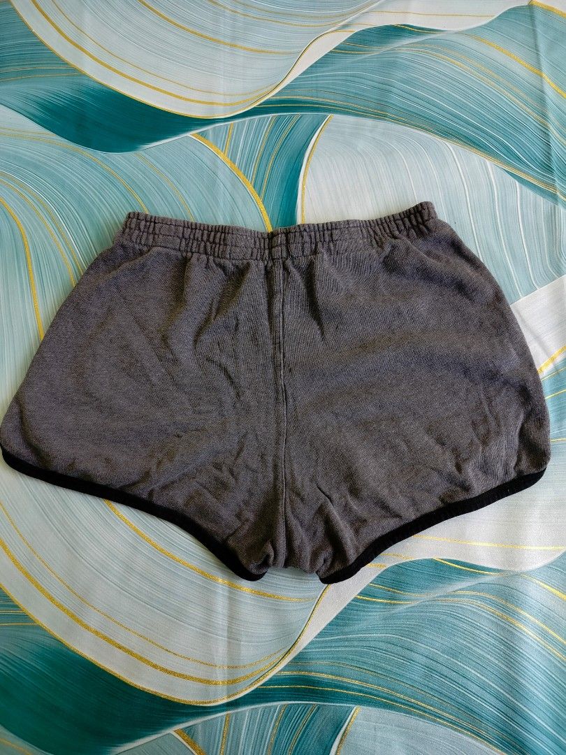 Brandy Melville Heather Grey Shorts (Category: Shorts) located in Manila. Submitted by virgiliosa38485 (Listing ID 1467113076, Image 3). Description: - Brand: Brandy Melville -Waist 28-36 - Color/Style: Grey cotton blend with contrast black trim - Interior: Soft fleece lining for maximum comfort - Fit: Elastic waistband, one size fits most - Origin: Made in Italy - Condition: Great for lounging, sleeping, or casual wear.