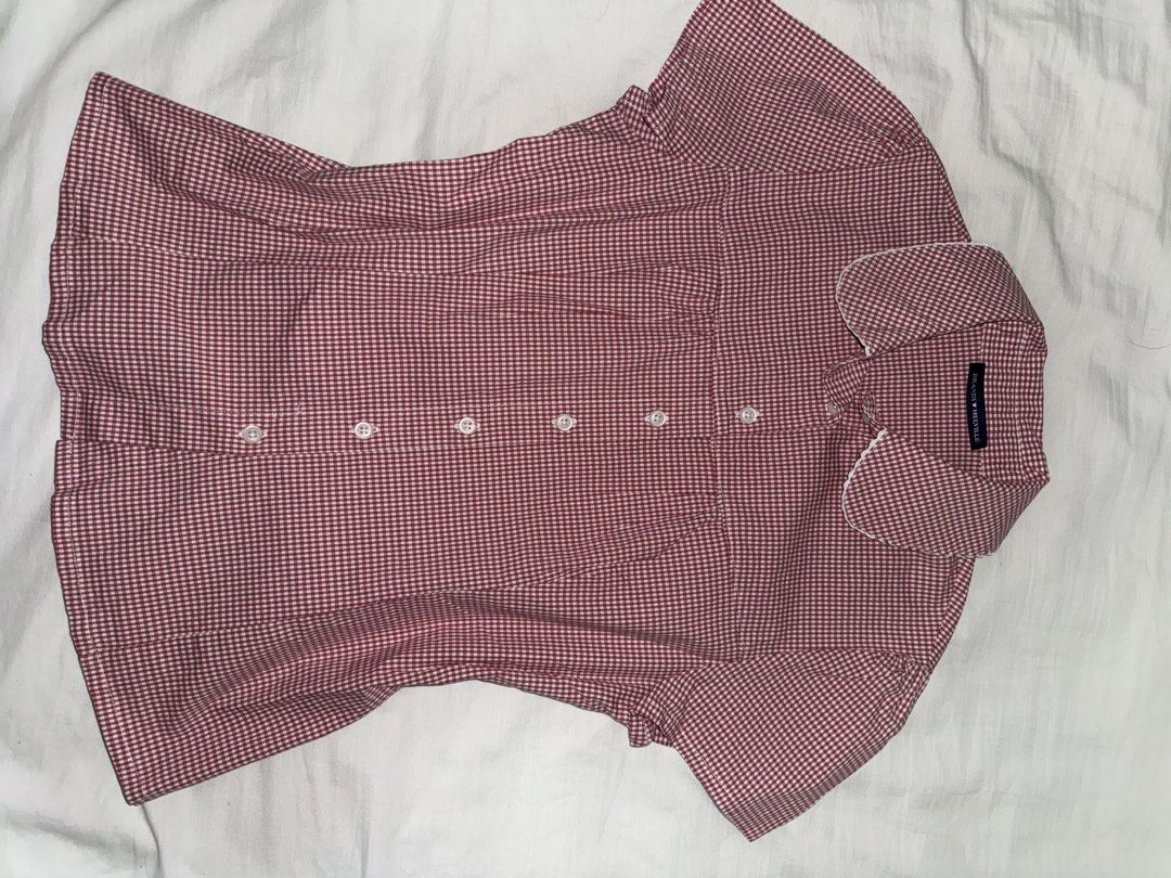 Brandy Melville Rue Plaid Top (Category: Blouses) located in Taguig. Submitted by xiurecsz (Listing ID 1467026241, Image 3). Description: Red and white gingham print blouse from Brandy Melville. Short sleeves, collared neckline with scalloped white trim, button-down front. Fitted cut. Worn once, washed and clean. Great basic for summer or layering..