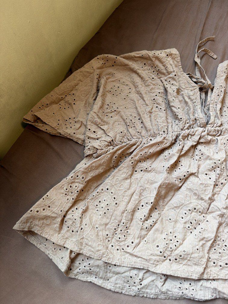 Brown Korean inspired Peplum Top (Category: Blouses) located in Pasig City. Submitted by thegoodfind.ph (Listing ID 1467040130, Image 2). Description: Doily design V neck With strap at the back Best fits small-large.