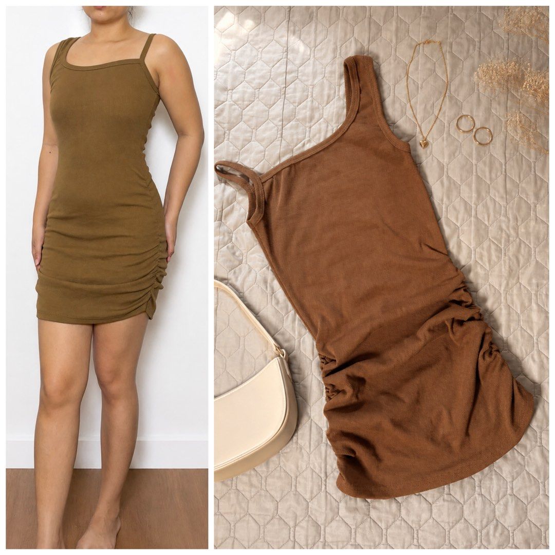 Brown Ruched Bodycon Mini Dress (Category: Dresses) located in Paranaque City. Submitted by delexxzah (Listing ID 1467043510, Image 1). Description: Simple and flattering brown mini dress with spaghetti straps and ruched detailing on the side. Perfect for casual outings, dates, or everyday styling. - Used once .