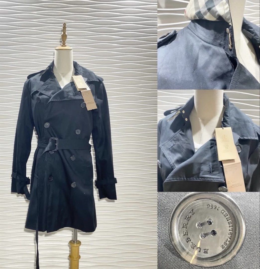 Burberry Black Trench Coat with Check Lining (Category: Coats, Jackets and Outerwear) located in Bacolod City. Submitted by bhabissagal-05763 (Listing ID 1466994782, Image 2). Description: - Brand new with tags still attached - Classic black trench coat with iconic beige check lining - Double-breasted front with tortoiseshell-effect engraved buttons - Includes a matching waist belt and adjustable buckled cuffs - Mid-length cut, ideal staple piece