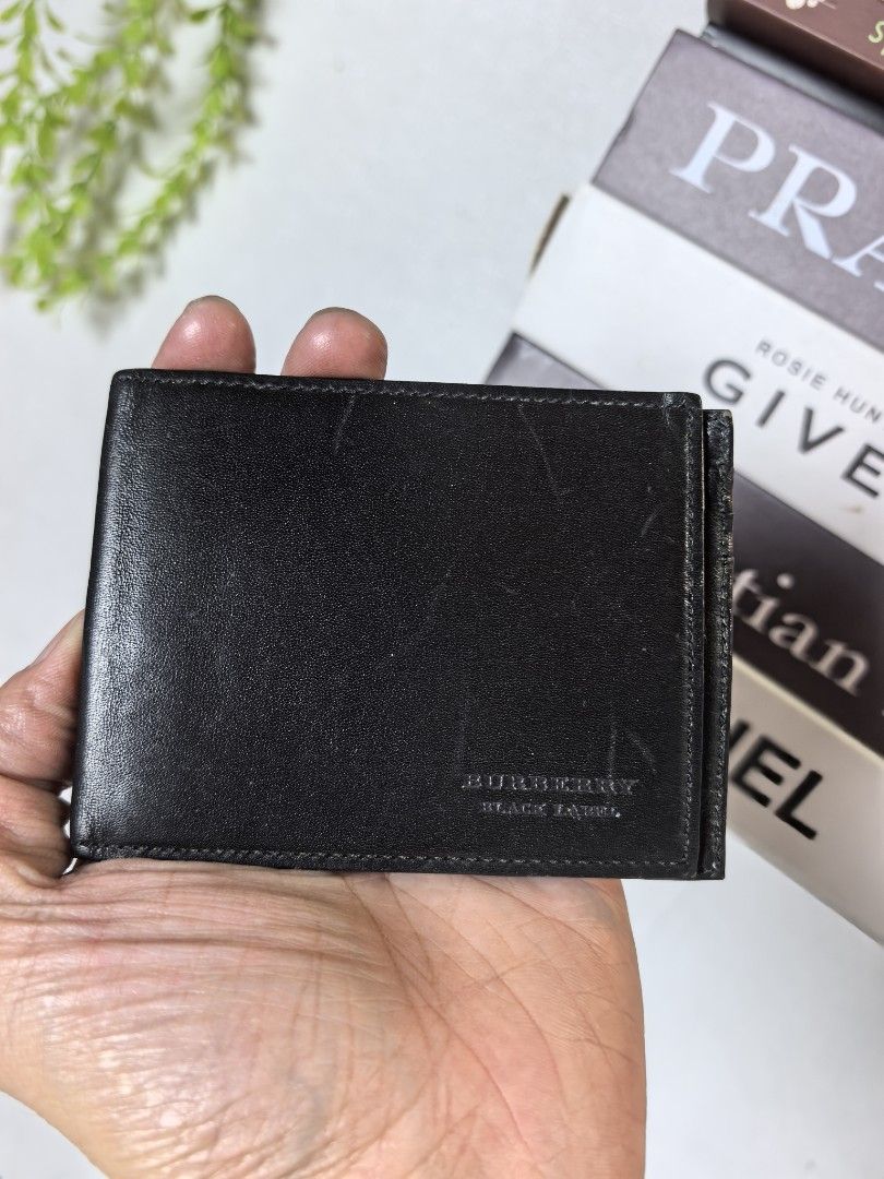 Burberry black wallet (Category: Luxury Bags & Wallets) located in Baguio. Submitted by ashzachary (Listing ID 1467123065, Image 1). Description: Burberry black mini wallet Condition :Excellent condition Color rate 10/10 Size :small No issues No flaws Super ganda sa personal Pm. More details Good quality Plsss 📌No Bogus 📌No return MOP What you see is what you get PALAWAN, CEBUNA GCASH AND BDO Reminder😊 We're selling thrifted clothes so please 