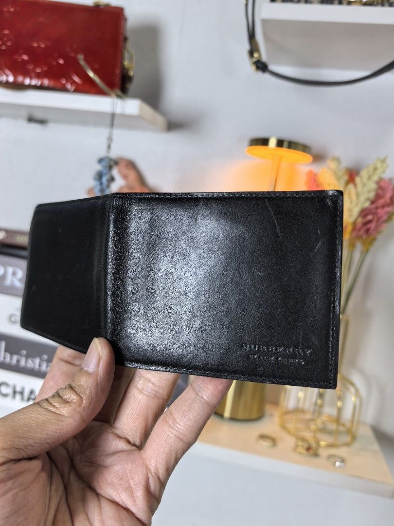Burberry black wallet (Category: Luxury Bags & Wallets) located in Baguio. Submitted by ashzachary (Listing ID 1467123065, Image 2). Description: Burberry black mini wallet Condition :Excellent condition Color rate 10/10 Size :small No issues No flaws Super ganda sa personal Pm. More details Good quality Plsss 📌No Bogus 📌No return MOP What you see is what you get PALAWAN, CEBUNA GCASH AND BDO Reminder😊 We're selling thrifted clothes so please 