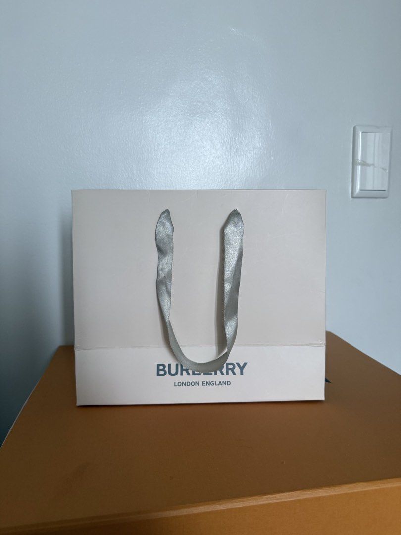 Burberry Paper Bag (Category: Luxury Bags & Wallets) located in Pasig City. Submitted by roadtominimalism09 (Listing ID 1467024840, Image 1). Description: Measurements: 10(H), 8(w) x 4.5 (depth) Fragrance paper bag .