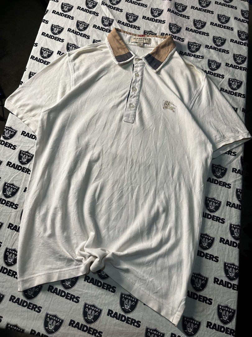 Burberry Polo (Category: Tshirts & Polo Shirts ) located in Leon. Submitted by fluffythriftshop (Listing ID 1467081073, Image 2). Description: Burberry Polo Medium 18.5x26.5 Needwash stain Excellent Condition .