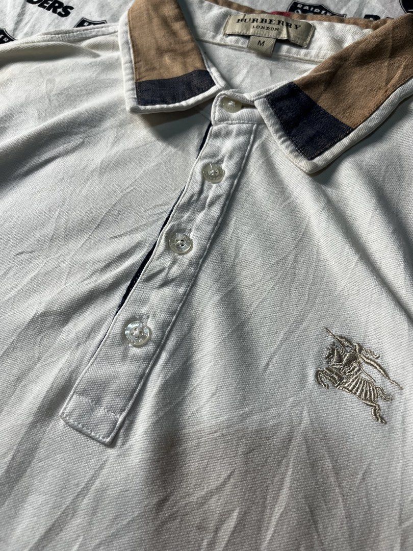 Burberry Polo (Category: Tshirts & Polo Shirts ) located in Leon. Submitted by fluffythriftshop (Listing ID 1467081073, Image 3). Description: Burberry Polo Medium 18.5x26.5 Needwash stain Excellent Condition .
