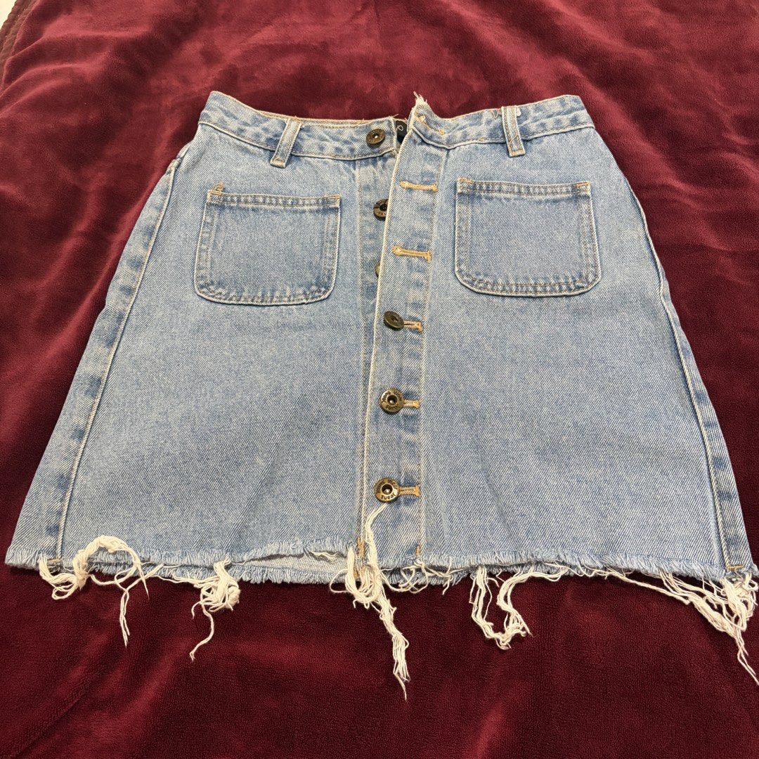 Button denim skirt (Category: Skirts) located in Manila. Submitted by serra_shop (Listing ID 1467051123, Image 1). Description: Goods Waist: 23-25 Location: Pampanga Courier: J&T.