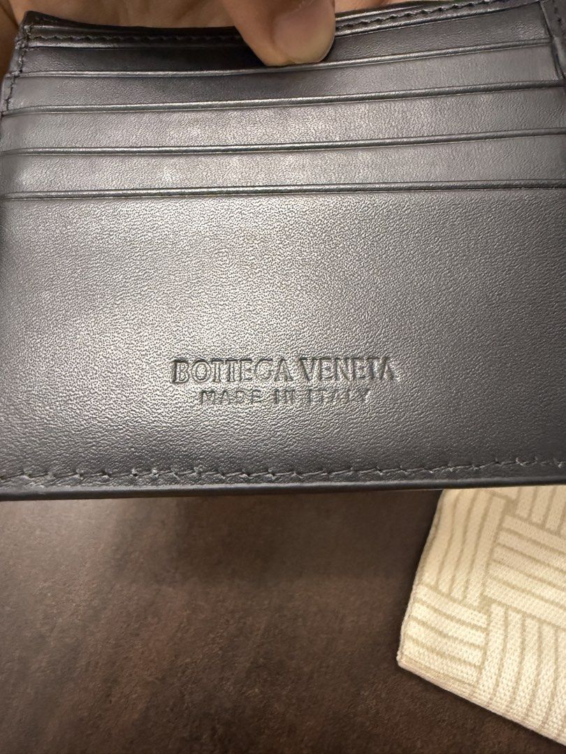 BV Intrecciato Bi-Fold Wallet (Category: Wallets & Card Holders) located in Makati City. Submitted by jorgenfinch (Listing ID 1467089506, Image 2). Description: Intrecciato bi-fold wallet Black Genuine leather With box and dust bag Very slightly used and good as new I’m on the night shift so replies may be slow during the day 📍Legazpi Village, Makati City Buyer will be responsible for booking and paying for same-day delivery service.