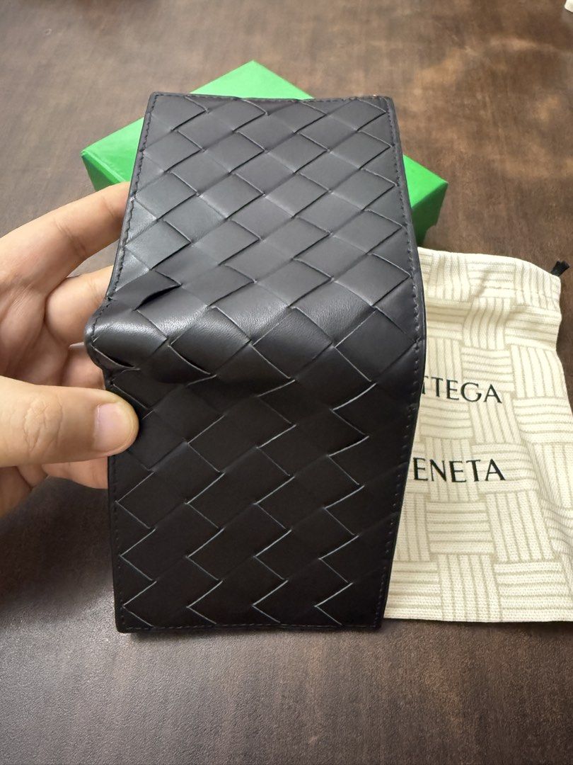 BV Intrecciato Bi-Fold Wallet (Category: Wallets & Card Holders) located in Makati City. Submitted by jorgenfinch (Listing ID 1467089506, Image 3). Description: Intrecciato bi-fold wallet Black Genuine leather With box and dust bag Very slightly used and good as new I’m on the night shift so replies may be slow during the day 📍Legazpi Village, Makati City Buyer will be responsible for booking and paying for same-day delivery service.