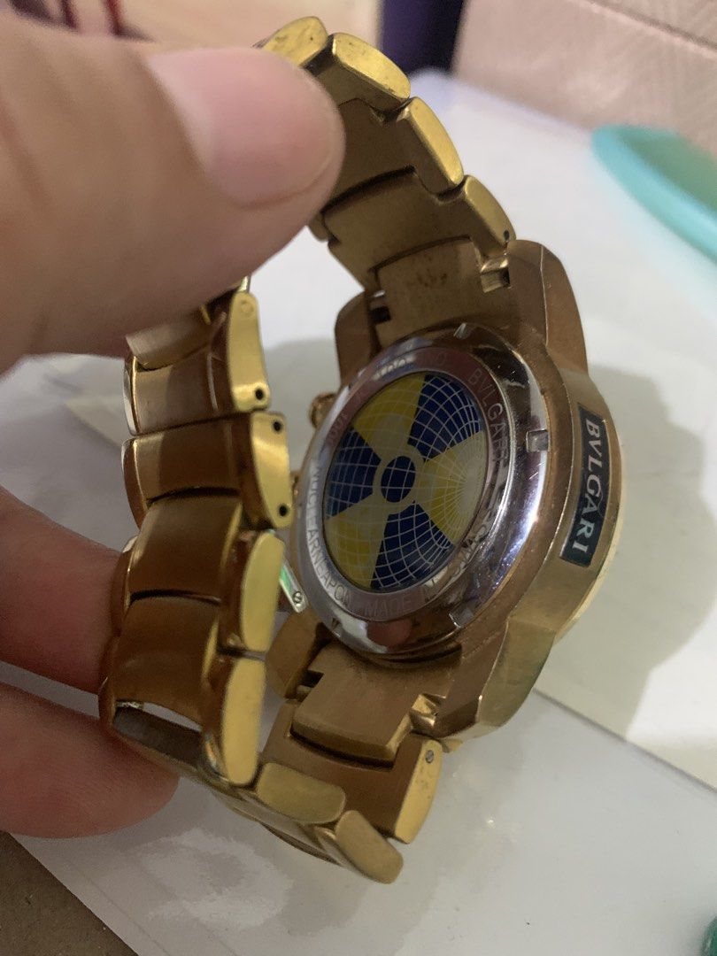 Bvlgari Gold Tone Chronograph Watch (Category: Men's Watches) located in Paranaque City. Submitted by declutterby4angels (Listing ID 1467123318, Image 2). Description: - Brand: Bvlgari - Design: Gold-tone finish with skeletal dial and matching metal link bracelet - Features: Multiple sub-dials, tachymeter bezel, date window, and decorative case back - Condition: Overall signs of wear on the gold plating from previous use - Includes: Crown and fun