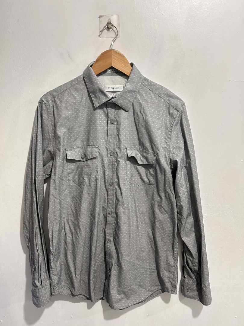 Calvin Klein Infinite Cool Gray Long Sleeve Button Down Shirt (Category: Longsleeves) located in Rizal. Submitted by thrift_finds_739 (Listing ID 1467070625, Image 1). Description: NO ISSUE Size: Medium | For Women Color rate: 9/10 Length: 27 Width: 21 Please manage your expectations — we open premium bulk ukay bundles shipped directly from the US! 🇺🇸.