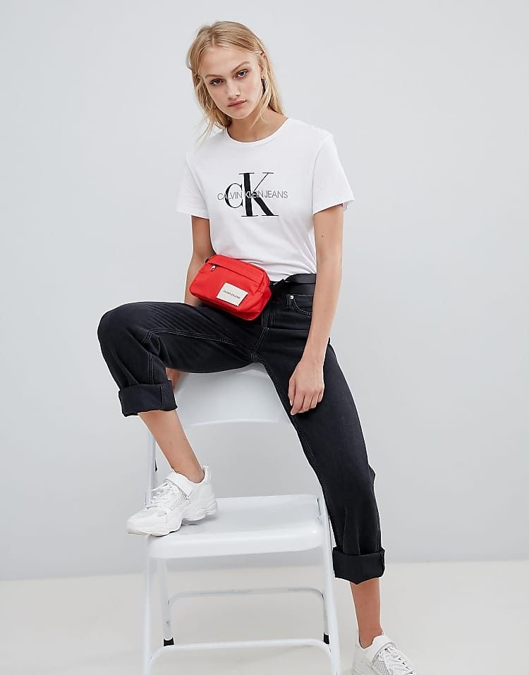 Calvin Klein Jeans Core Monogram Logo Tee (Category: Tshirts & Polo Shirts ) located in Baliuag. Submitted by retrovault83 (Listing ID 1467131142, Image 1). Description: ✨ Condition: 9/10 – Excellent Preloved Condition 📏 Measurements (Flat Lay, Tagged Size S): • Pit to Pit: 18 • Length: 25 ✅ Details: • Calvin Klein Jeans Graphic T-Shirt • Clean white body featuring classic black "cK" big logo print with embroidered "Calvin Klein Jeans" front tex