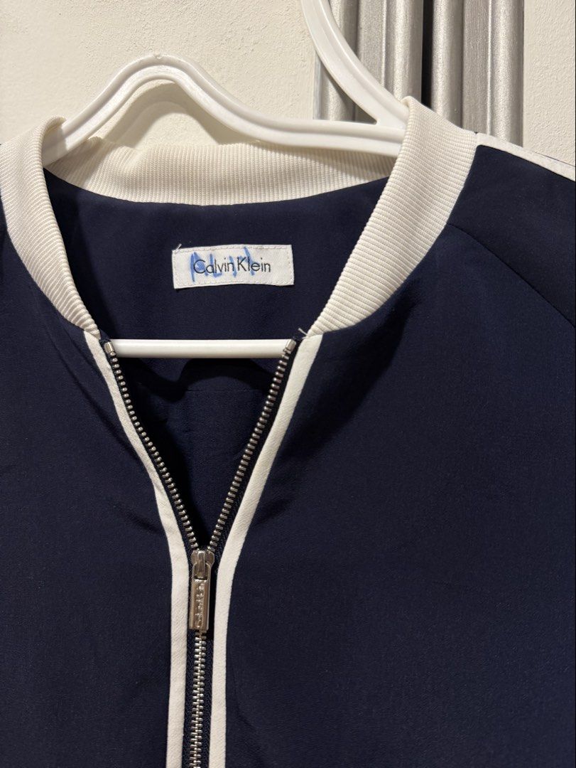 Calvin Klein Navy Blue Sport Track Jacket (Category: Coats, Jackets and Outerwear) located in Muntinlupa City. Submitted by alexisofia (Listing ID 1467021063, Image 3). Description: like new, worn a few times only / excellent condition bought in the US! size: Medium/Large Brand Calvin Klein.