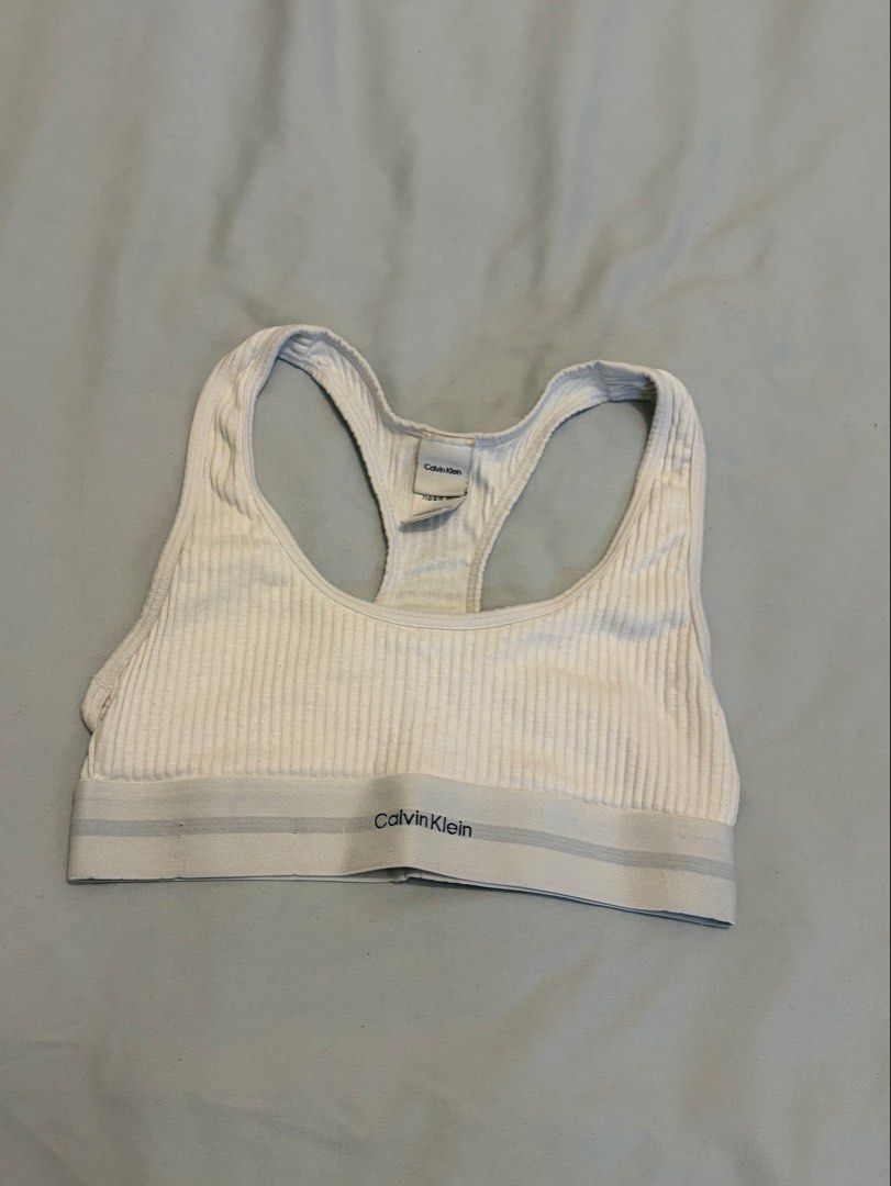 Calvin Klein White Ribbed Racerback Bralette original (Category: Sleeveless) located in Manila. Submitted by kim_hansu (Listing ID 1467154128, Image 1). Description: bust size : 32B.