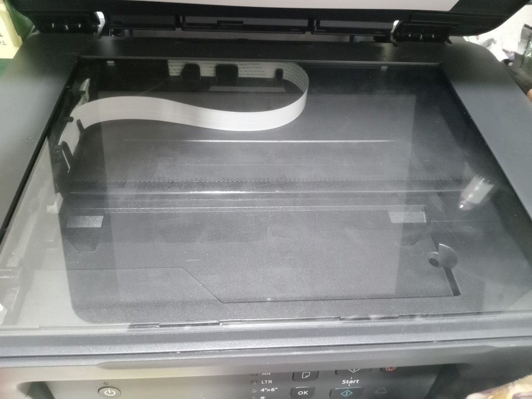 Canon PIXMA G2730 Mega Tank Printer (Category: Printers, Scanners & Copiers) located in Paranaque City. Submitted by ibengivyja87388 (Listing ID 1467091864, Image 2). Description: - Model: Canon PIXMA G2730 Mega Tank All-in-One Printer - Condition: Good working order with a clean exterior - Ink System: Continuous ink supply system with front-facing visible reservoirs for easy monitoring - Functions: Print, scan, and copy with an integrated flatbe