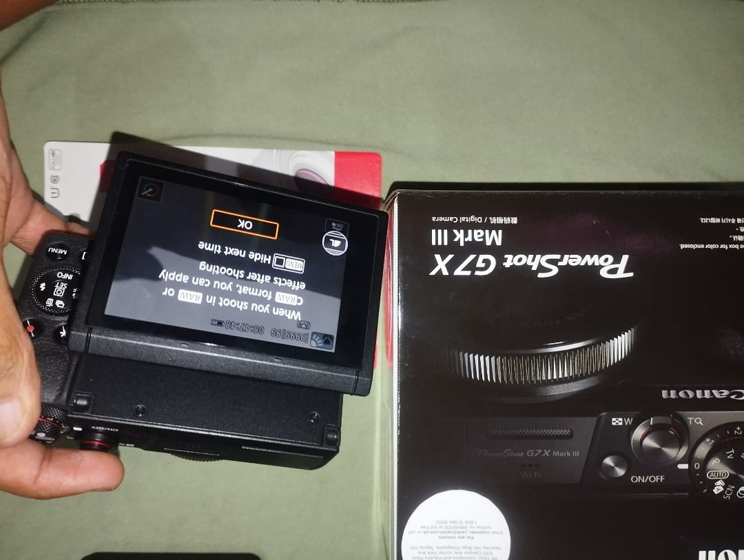 Canon PowerShot G7 X Mark III Digital Camera (Category: Cameras) located in Quezon City. Submitted by roxaschloeeex (Listing ID 1467164271, Image 2). Description: - Model: Canon PowerShot G7 X Mark III (Black) - Condition: Excellent, clean body with zero scratches and fully intact controls - Features: Compact pocket size, powerful zoom lens, and fully functional flip-up screen - Hardware: Battery compartment and port covers close tightly - Inclus