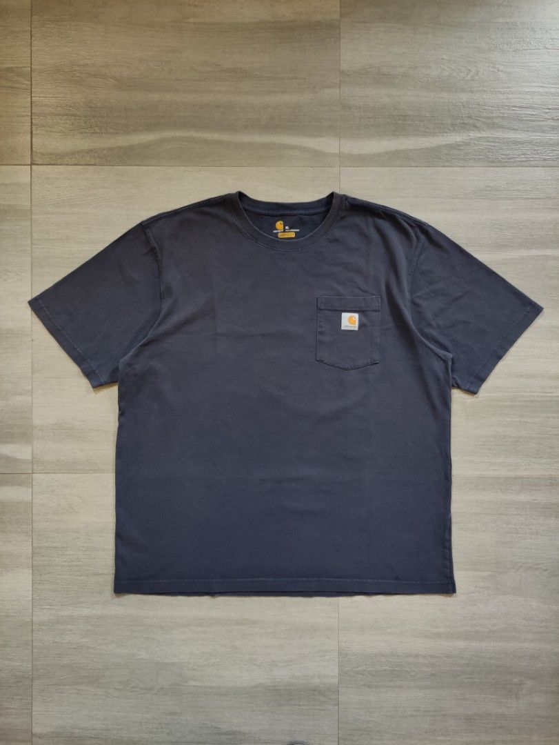 Carhartt K87 NVY Pocket Tee (Category: Tshirts & Polo Shirts ) located in Calamba. Submitted by alorbis96758 (Listing ID 1467082259, Image 1). Description: Chest Width : 25" Length : 31" Best Fit : XL ~ 2XL Color Rate : 9 Flaws : Nail Holes, Minor Sunfade on Neckline.