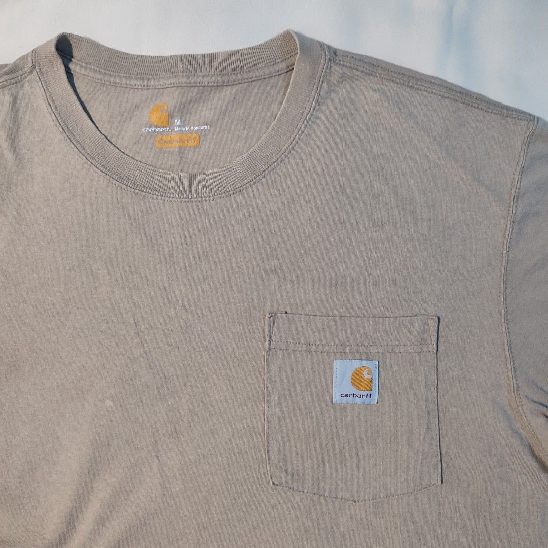 CARHARTT POCKET TEE K87 (Category: Tshirts & Polo Shirts ) located in Tarlac. Submitted by joel_dat_kom_187 (Listing ID 1467062074, Image 2). Description: CARHARTT POCKET TEE K87 22.5 x 29 ( MEDIUM ) 9 UP / 10 COLORATE & CONDITION 9 UP/10 CONDITION NEED WASH 📍 ISSUE LAST PICTURE OIL STAIN.